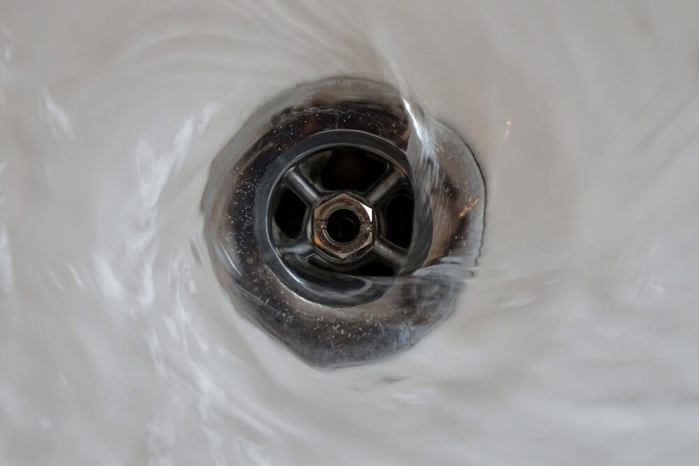 how to remove plunger from bathtub drain